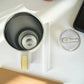 Vista superior de termo de acero inoxidable color blanco con tapa de rosca y pajilla incluida, capacidad 1200 ml.