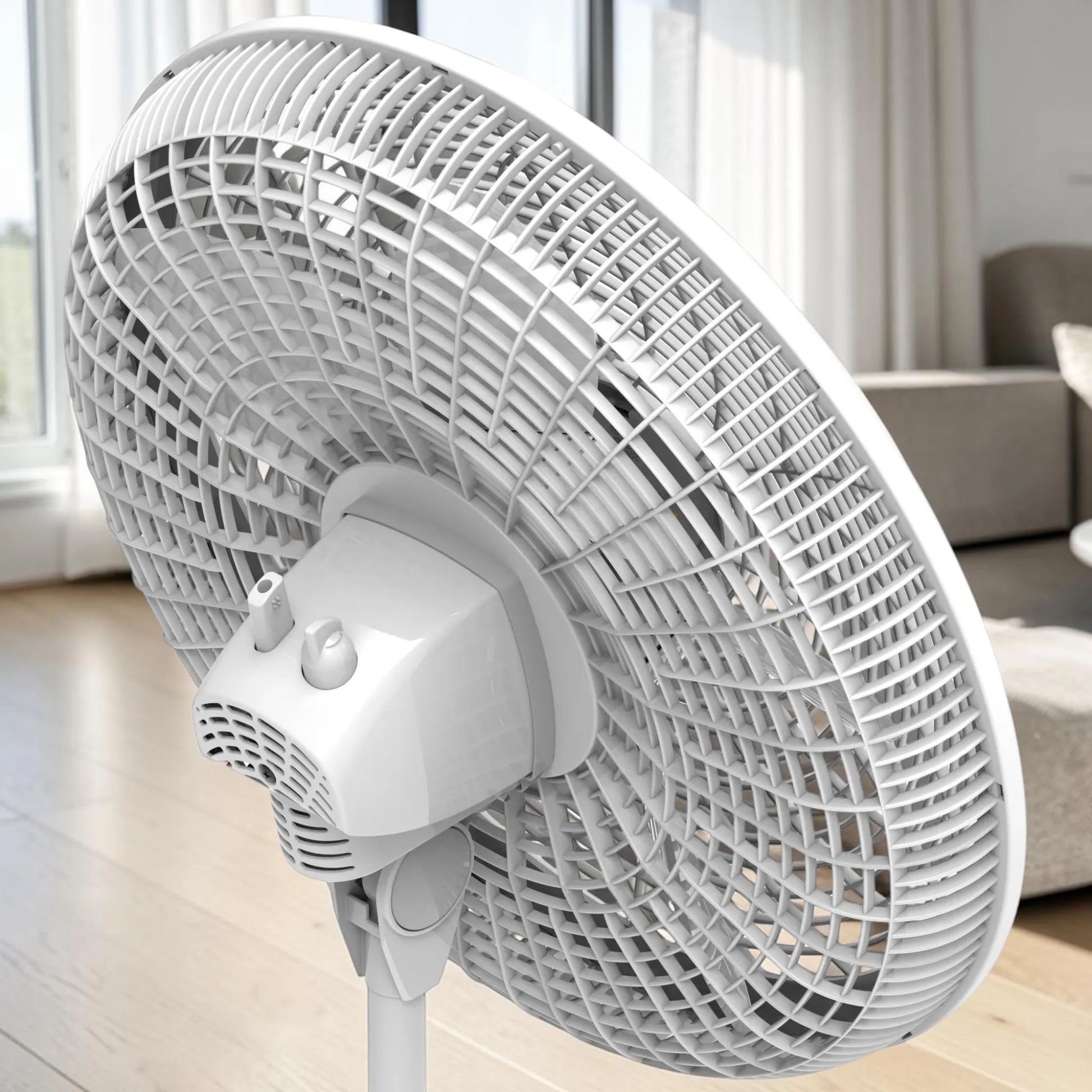 Vista trasera del ventilador pedestal Lasko 1820 blanco con controles manuales, rejilla protectora e inclinación ajustable.